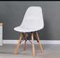Modern White Accent Chair with Wooden Legs and Black Metal Supports