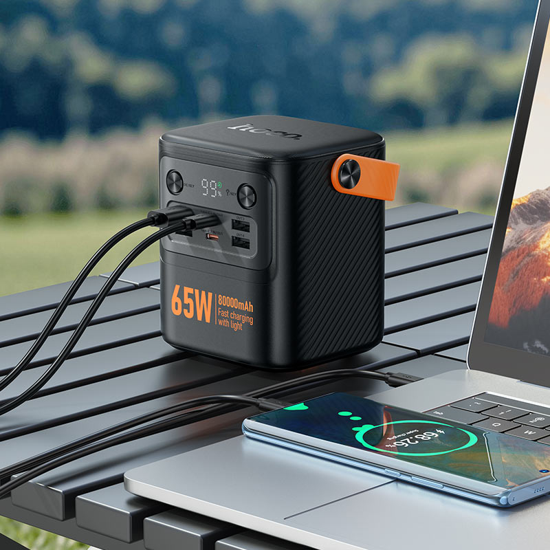 Hoco J152 Pro power bank side view showing carbon fibre texture and orange handle